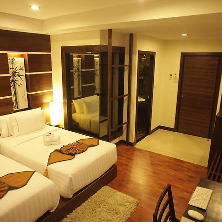 Отель Bamboo House Phuket Карон Экстерьер фото