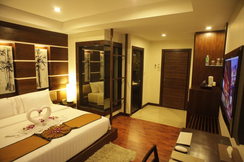 Отель Bamboo House Phuket Карон Экстерьер фото