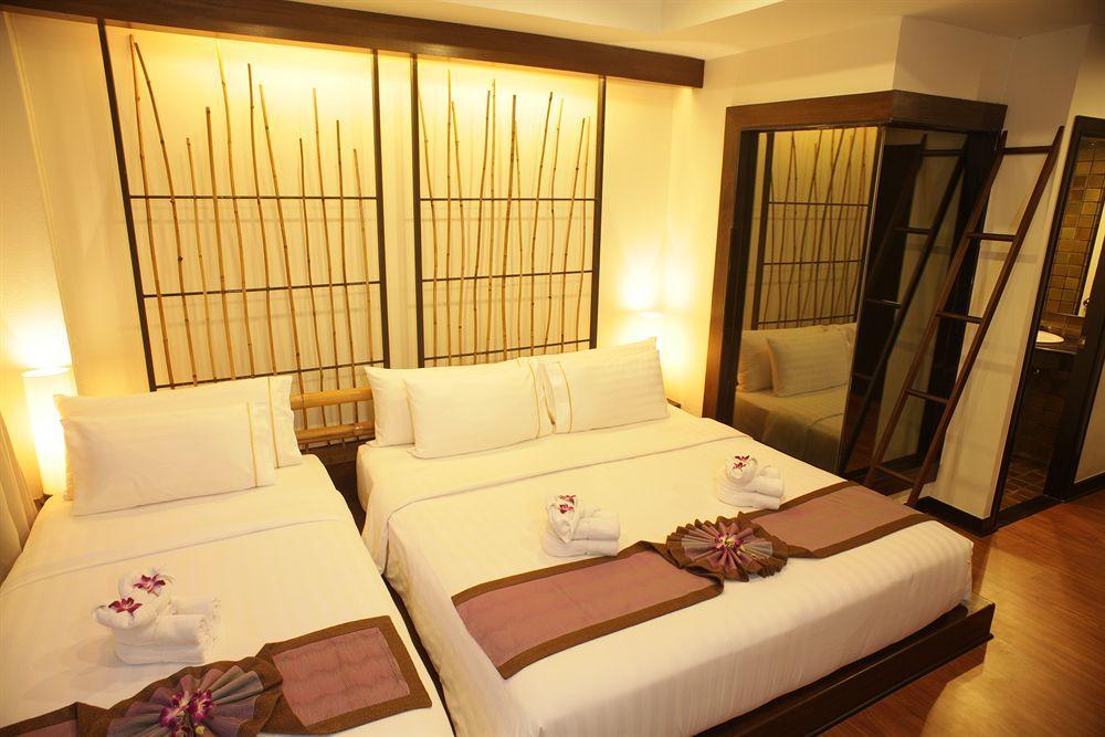 Отель Bamboo House Phuket Карон Экстерьер фото