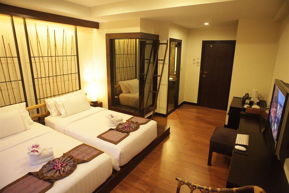 Отель Bamboo House Phuket Карон Экстерьер фото