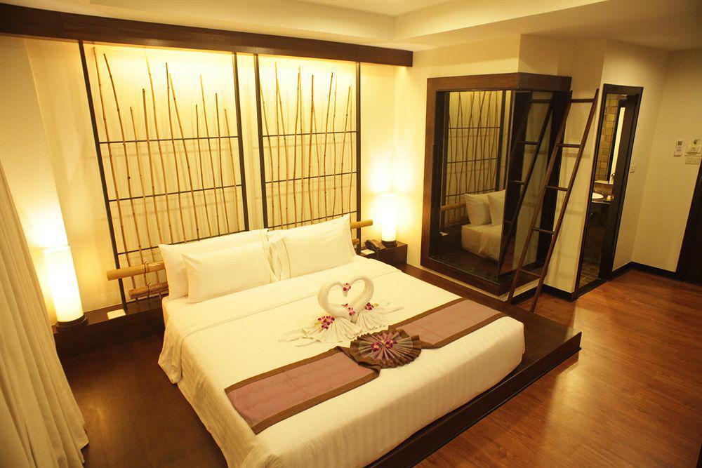 Отель Bamboo House Phuket Карон Экстерьер фото